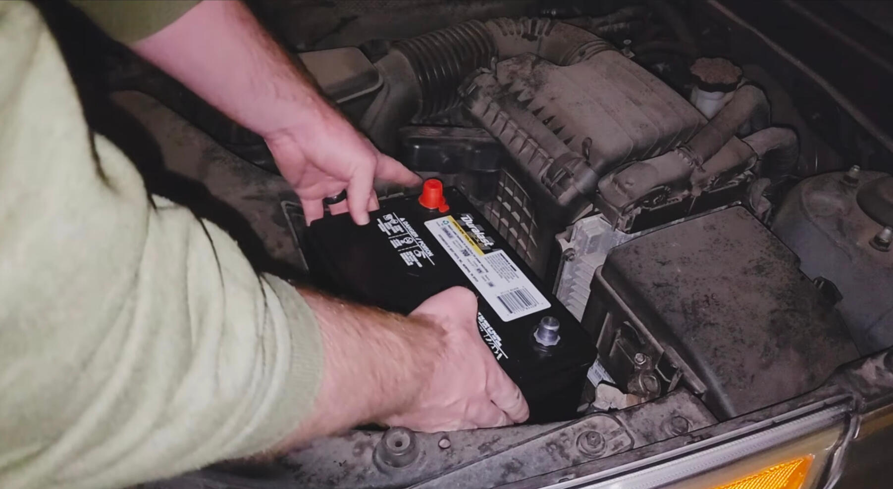 Mobile Battery Replacement Fort Worth TX Mobile mechanic installing a new car battery during battery replacement service in Fort Worth Texas